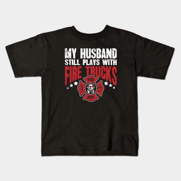 Firefighter wife My husband still plays with fire trucks Kids T-Shirt by captainmood